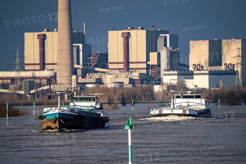 Cargo ships on the Rhine near Rheinberg, in the background the decommissioned Voerde coal-fired power station, which is currently being dismantled, flood, North Rhine-Westphalia, Germany, Europe