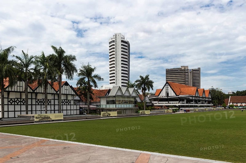 Modern buildings and green field in the city centre of Kuala Lumpur, Malaysia, Asia