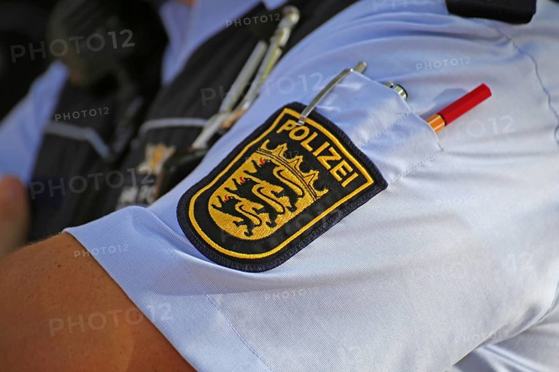 State coat of arms of Baden-Württemberg on the shirt of a policeman