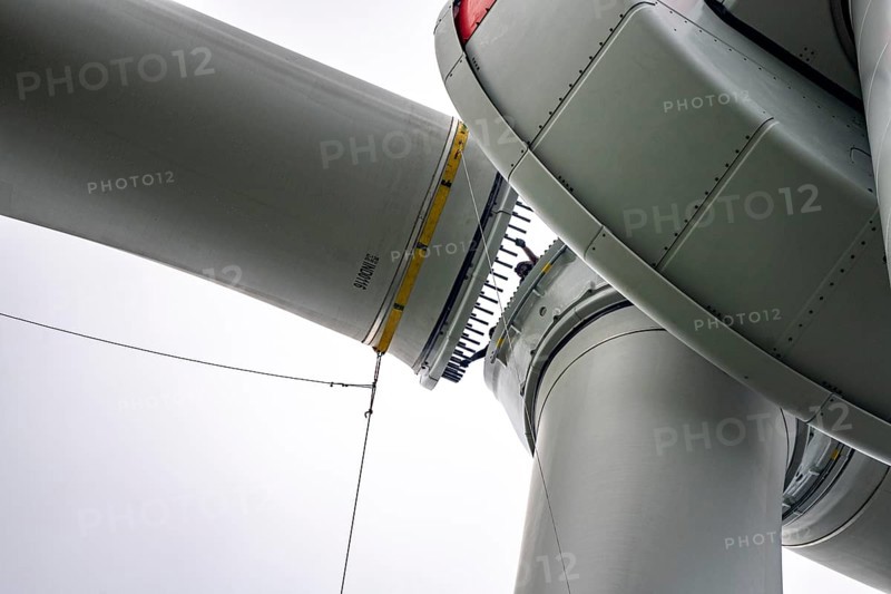 Erection of a wind turbine, wind energy plant, assembly of the third blade, with a crawler lattice crane, wind farm near Hagen, North Rhine-Westphalia, Germany, Europe