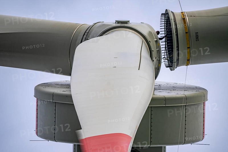 Erection of a wind turbine, wind energy plant, assembly of the third blade, with a crawler lattice crane, wind farm near Hagen, North Rhine-Westphalia, Germany, Europe