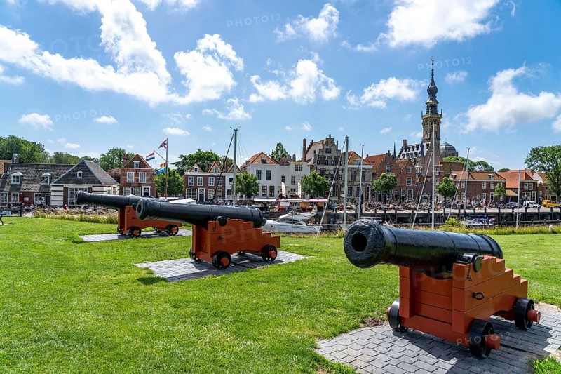 The town of Veere, province of Zeeland, marina, sailing harbour, tower of the old town hall, cannons of the old bastion, Netherlands