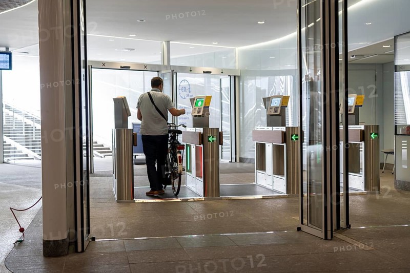 New bicycle car park at Amsterdam Central Station, IJboulevard, space for around 4000 bicycles, digitally monitored, single exit, underground, direct connection to the station, built into the water of the IJ, at the back of the station, Netherlands