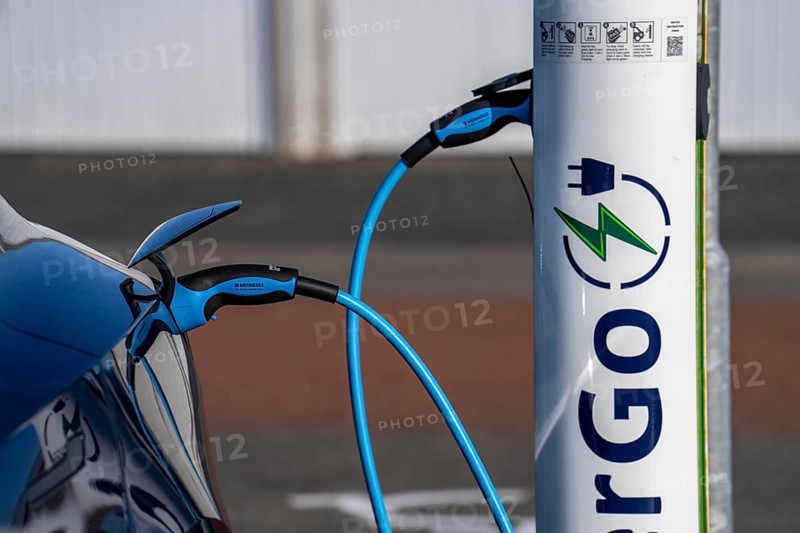 Electric car fast charging station, from the Dutch provider PowerGo, in the ferry harbour of Eemshaven, powered by renewable energy, Netherlands