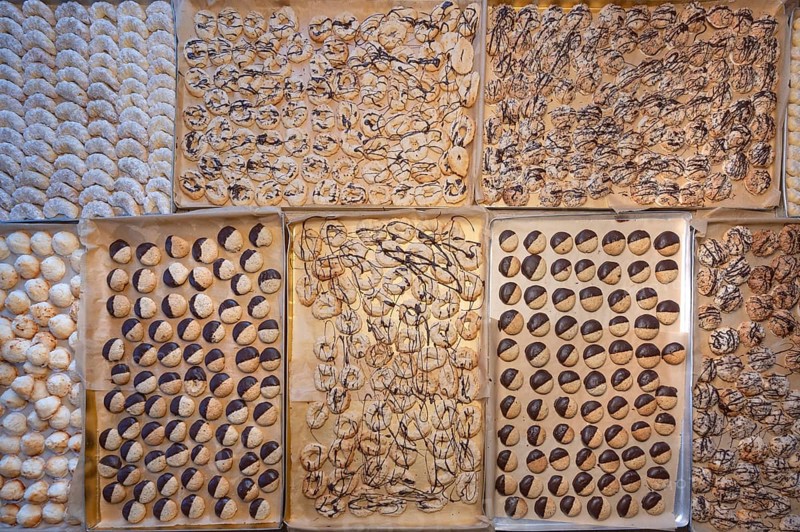 Ready-baked biscuits arranged on baking trays, Bavaria, Germanybd