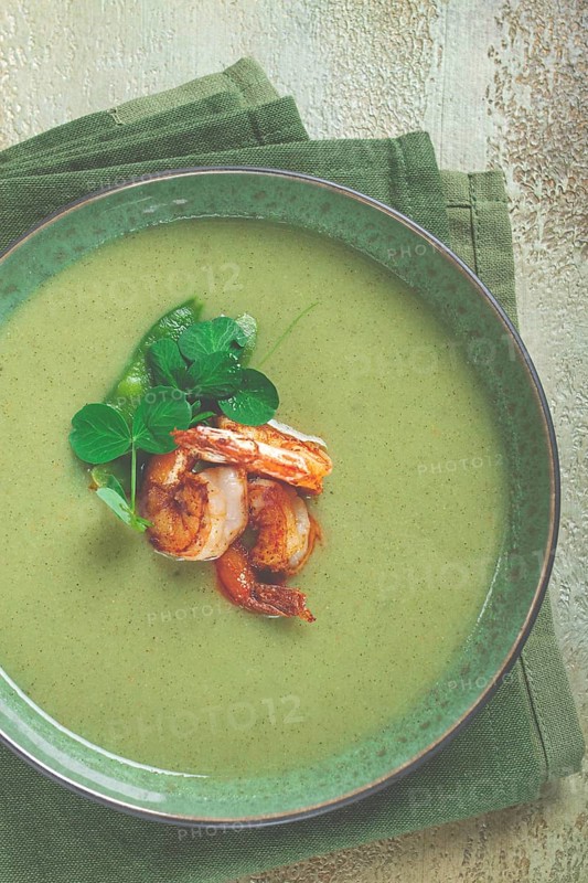 Pea cream soup, with shrimp, green soup, homemade, top view, no people