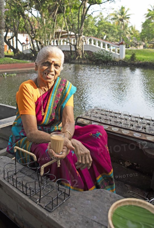 Tealady, 83 years old, shows an Indian tea on her boat, Backwaters, Kumarakom, Kerala, India, Asia