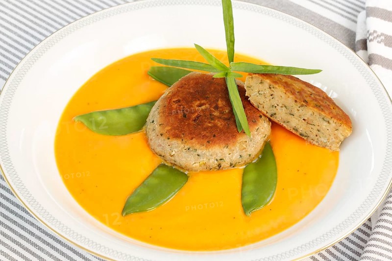Vegetarian cuisine, walnut cakes on sugar snap peas with pumpkin sauce, sauce, vegetables, snow peas, walnut, savoury, vegan, salty, fried, healthy, main course, soup plate, new cuisine, modern cuisine, beautifully arranged, food photography, studio, Germany, Europe