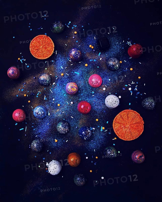 Food background, wallpaper, handmade candy, close-up, top view, texture starry sky, space, vertical, no people