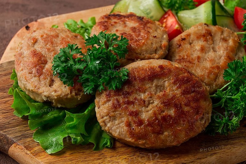 Fried cutlets, turkey, with vegetable salad, top view, no people