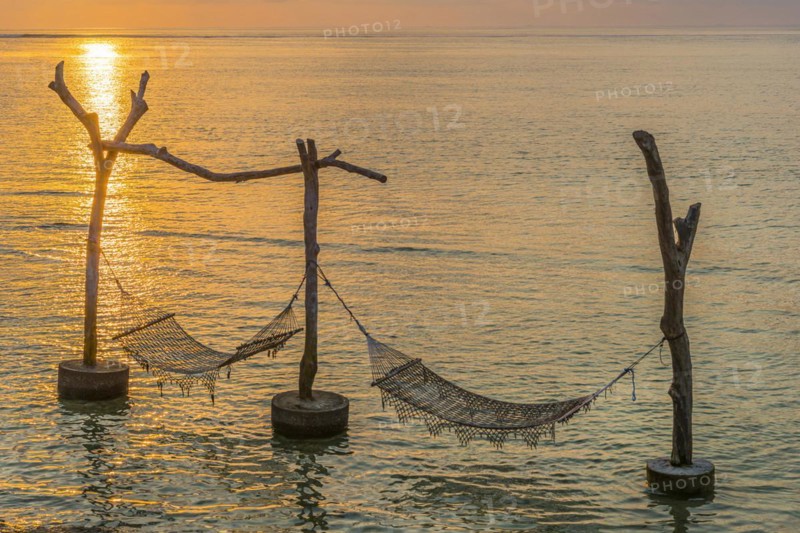 Hammock in the sea water in front of the holiday island Nusa Lembongan, beach, beach holiday, beach holiday, tourism, travel, tourism, summer, sun, climate, sunset, peace, serenity, chill out, chill out, relax, rest, lazing around, break, summer holiday, beach, evening sun, evening sky, sunset, romantic, romance, lonely, sea, island, ocean, tropical, hanging out, holiday dream, dream holiday, time out, nobody, empty, paradise, holiday paradise, long-distance trip, beautiful, travel photo, time, Bali, Indonesia, Asia