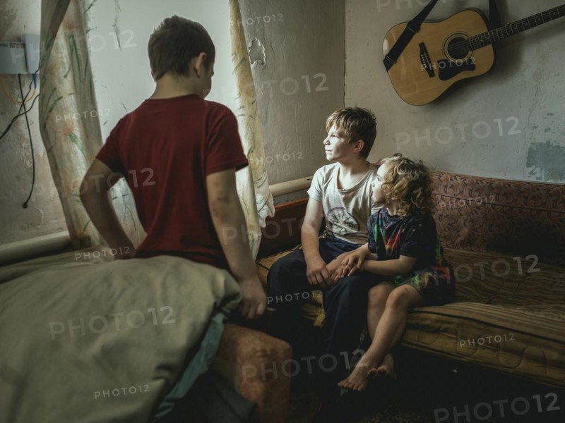 Sasha, 9 years old, Dima, 12 years old and Nastya, 5 years old. They live in the village of Borshchivka, which was occupied by the Russian army for over six months. They suffer from anxiety disorders, the front is only a few kilometres away as the crow flies, Borshchivka, Raion Isyum, Kharkiv Oblast, Ukraine, Europe