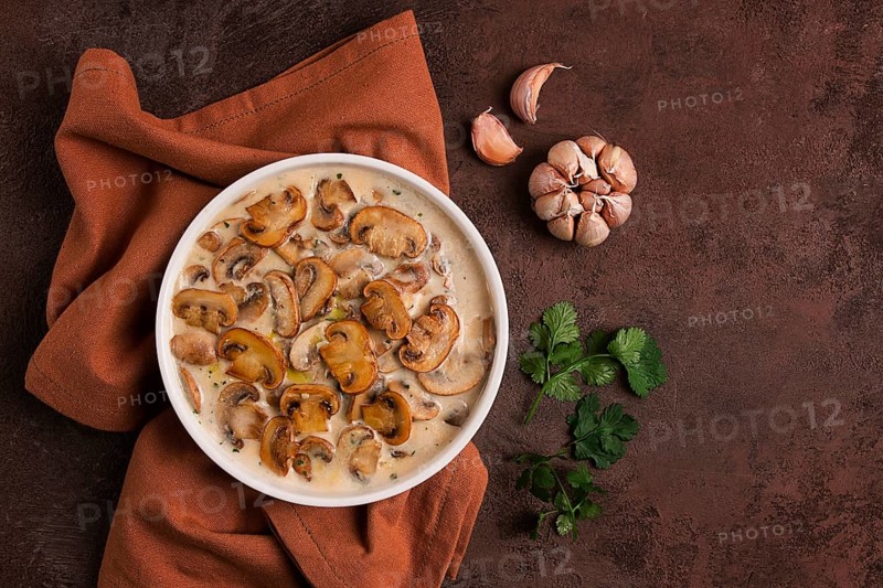 Champignons in creamy garlic sauce, with herbs and spices, gravy, sauce, no people