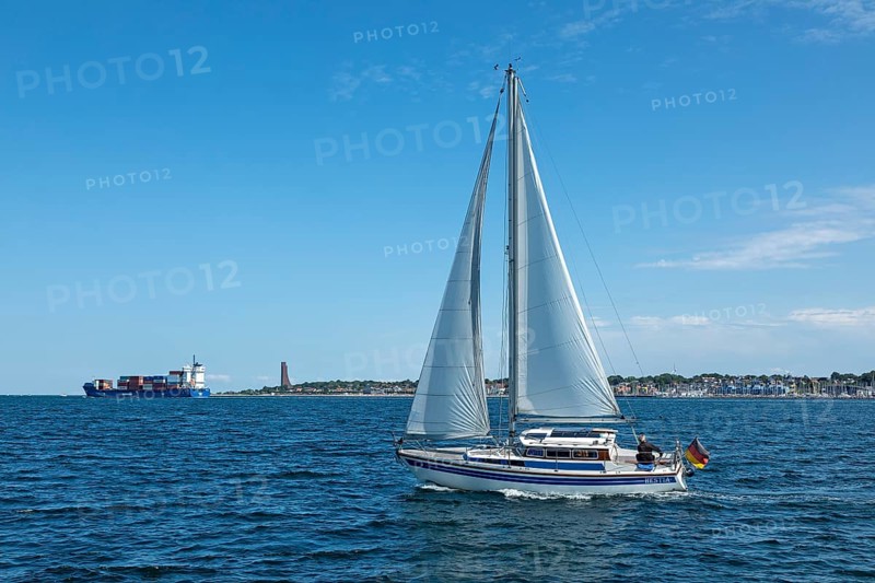 Container ship, sailing boat, naval memorial, Laboe, Schleswig-Holstein, Germany, Europe