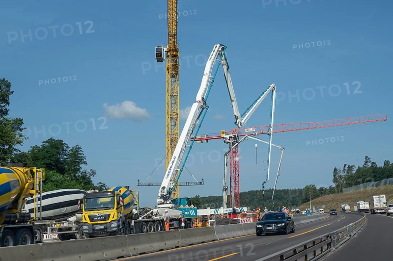 Construction cranes at a building site on the A6 motorway, Bavaria, Germany, Europe