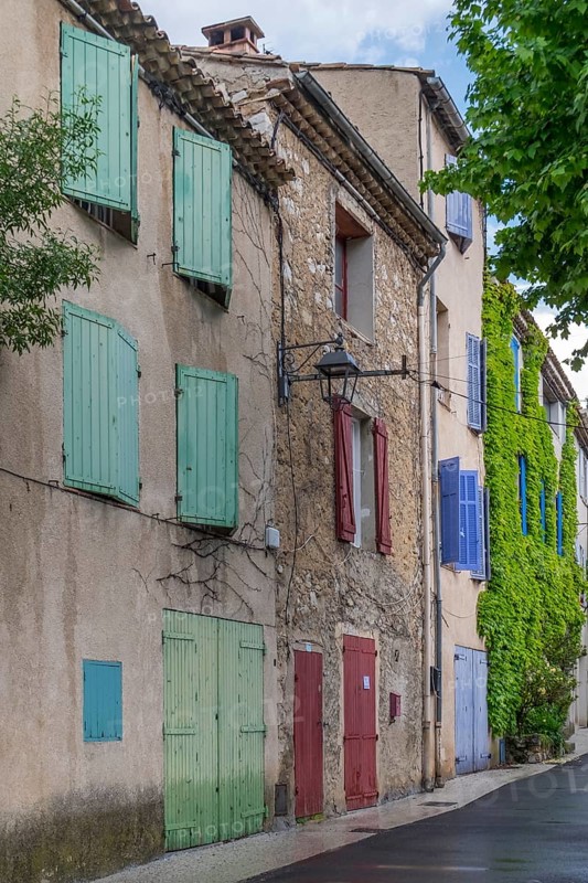 House facades with colourful window and door shutters, Vauvenargues, place of work of Pablo Picasso from 1958-1973, Provence-Alpes-Cote d'Azur, France, Europe