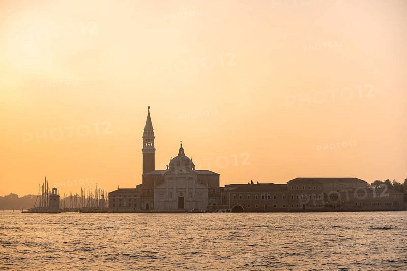 View over the water to the church of San Giorgio Maggiore, at sunrise, Venice, Veneto, Italy, Europe