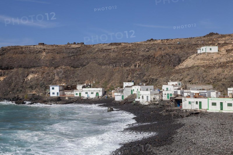 Puertito de los Molinos, beach, waves, several small white houses, west coast, Fuerteventura, Canary Islands, Spain, Europe