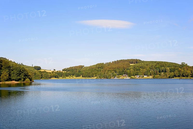 View over the Hennesee, blue sky with a cloud, Hennetalsperre, Naturpark Sauerland-Rothaargebirge, North Rhine-Westphalia, Germany, Europe