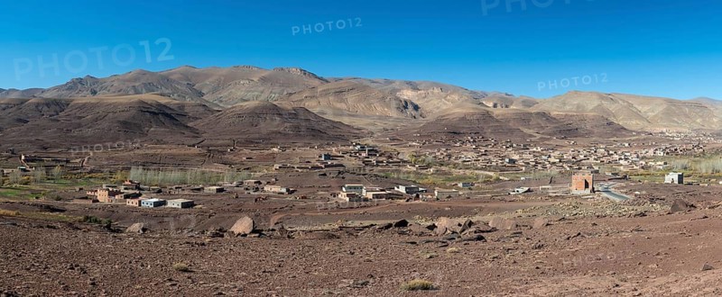 View of Taboulmante with colourful mountains in the background, layered landscape, Gorges du Dades, Dades Gorge, Morocco, Africa