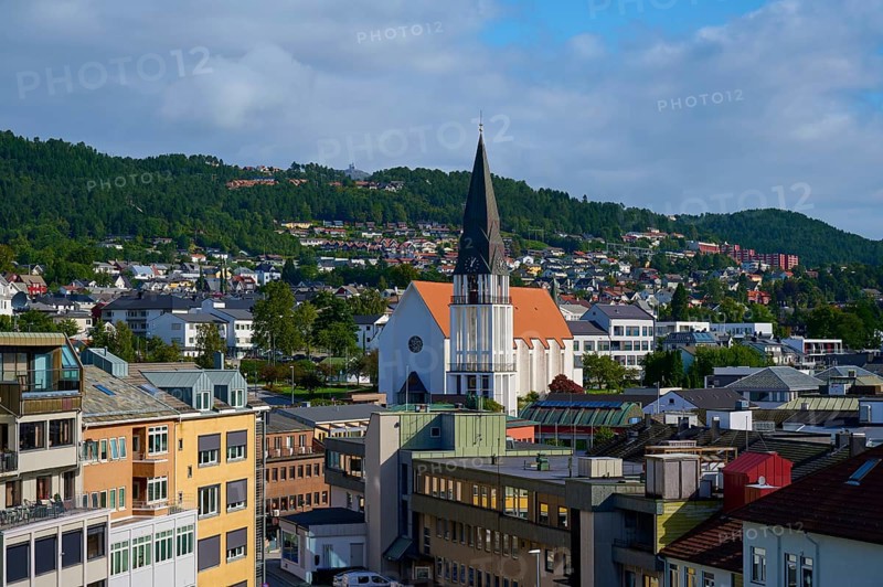 City of Molde with cathedral church and houses as well as mountains and sky in the background, Molde, Romsdal, Norway, Europe