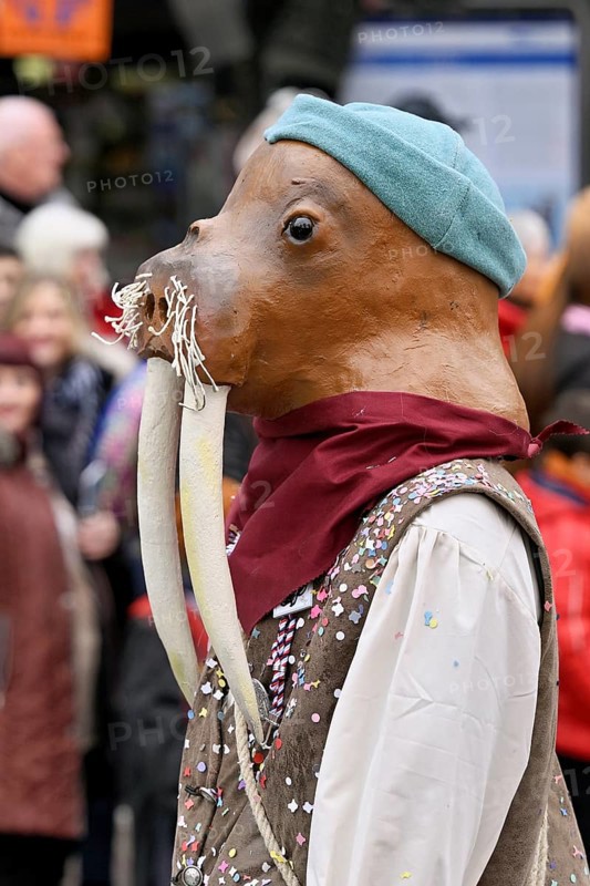 Person masked as a walrus at the carnival parade of the Wey guild on Rose Monday, Güdismäntig, Lucerne Carnival 2024, Lucerne, Switzerland, Europe