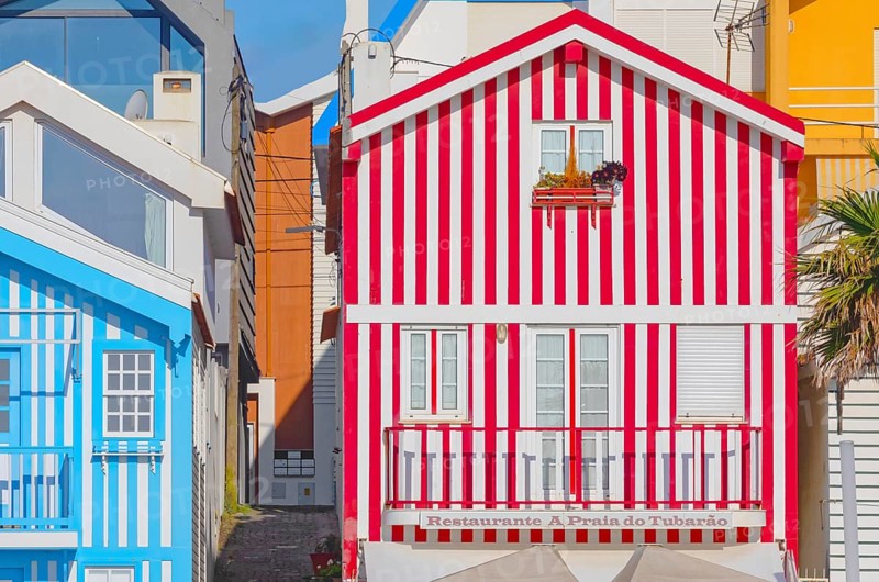 Brightly painted beach homes, Costa Nova do Prado, Aveiro, Portugal, Europe