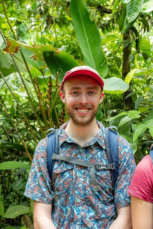 Tourist in the tropical rainforest, portrait, Corcovado National Park, Osa Peninsula, Puntarena Province, Costa Rica, Central America