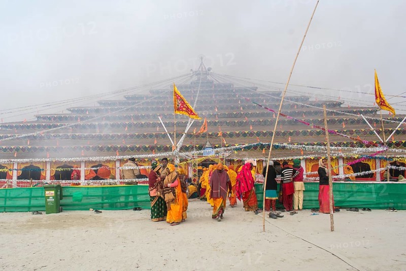 Devotees offer prayers at a makeshift Havan place on the eve of consecration ceremony of the Ram temple, in Ayodhya, Uttar Pradesh, India on 22 January 2024