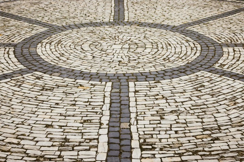 Detailed view of a rosette of white cobblestones at St Laurentius Church in Warendorf, Warendorf district, North Rhine-Westphalia, Germany, Europe