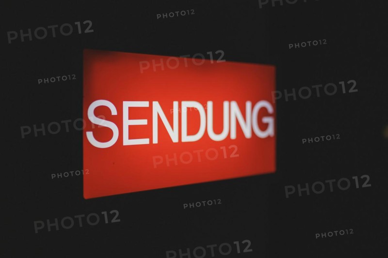 A luminous sign with the inscription 'Sendung' ('Broadcast') indicates a video recording in front of the parliamentary television studio in Berlin, 11 March 2024