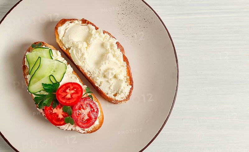 Sandwich, with cream cheese, homemade, on a cutting board, rustic style, no people, selective focus, breakfast
