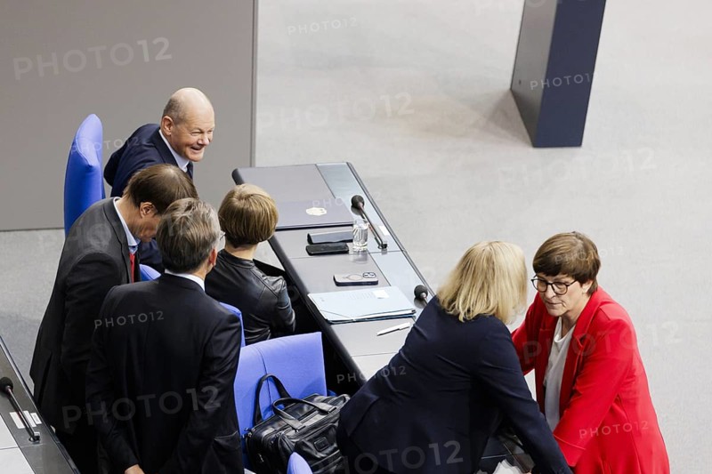 Olaf Scholz (SPD), Federal Chancellor, on the government bench, Nancy Faeser (SPD), Federal Minister of the Interior and Home Affairs, and Klara Geywitz (SPD), Federal Minister of Housing, Urban Development and Building, in plenary in front of the session in the German Bundestag, Berlin, 13 November 2024