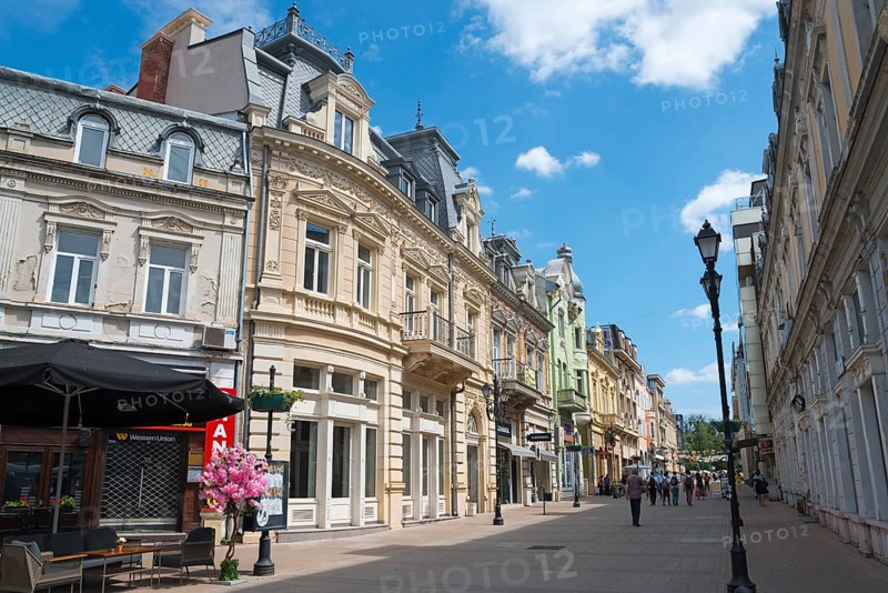 A lively city street with historic buildings under a blue sky on a sunny day, pedestrianised Alexandrovska, Russe, Rousse, Ruse, Pyce, Bulgaria, Europe