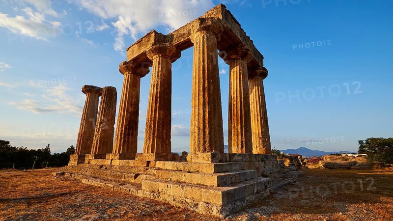 Archaic Temple of Apollo, Doric columns, Partially preserved ancient temple with columns against a sky just in front of sunset, Archaeological site, Archea Korinthos, Corinth, Peloponnese, Greece, Europe