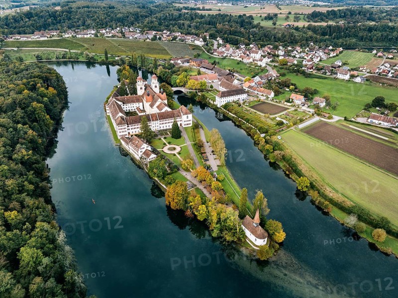 Aerial view of the former Benedictine abbey with the monastery church of St Mary and the pointed church of St Magdalena on the Rhine island of Rheinau, Andelfingen, Canton Zurich, Switzerland, Europe