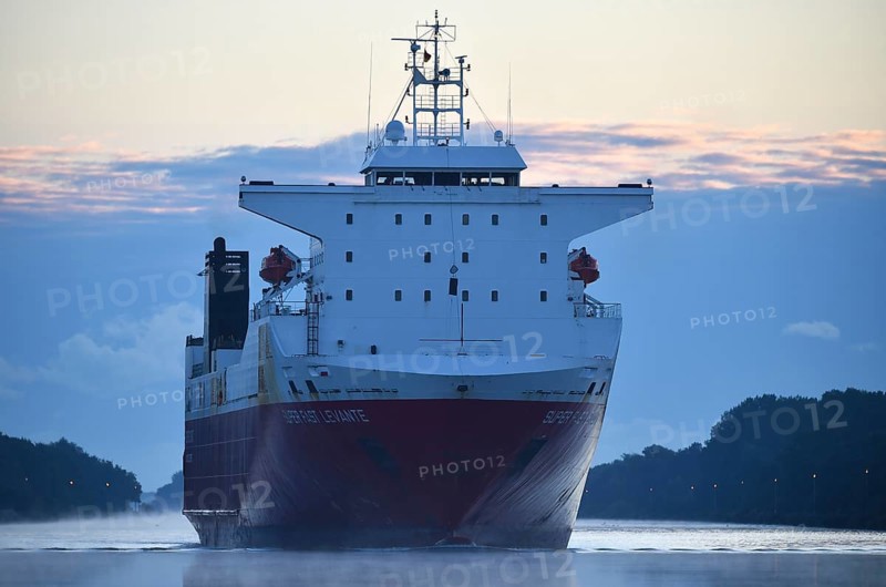 RoRo cargo ship Super Fast Levante travelling through the Kiel Canal at sunrise, Kiel Canal, Schleswig-Holstein, Germany, Europe