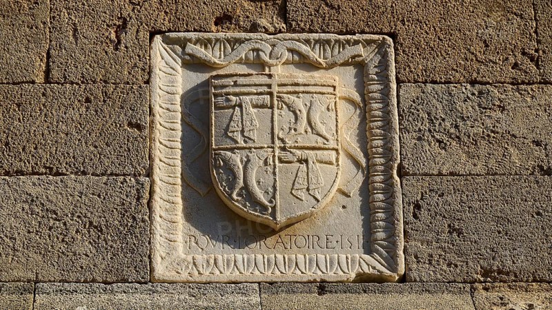 Small stone relief with a coat of arms and decorations, carved into a wall, Knights' Street, Rhodes Old Town, Rhodes Town, Rhodes, Dodecanese, Greek Islands, Greece, Europe