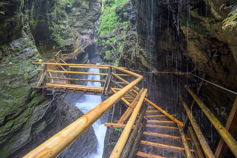 Water falls down on the climbing facility in the Raggaschlucht gorge, Flattach, Carinthia, Austria, Europe