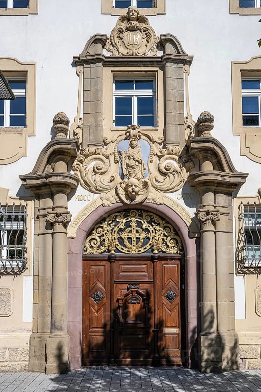 Portal decorated with stonemasonry at St Ursula's School, former St Clare's Monastery also known as Bickenkloster, Villingen-Schwenningen, Black Forest district, Baden-Württemberg, Germany, Europe
