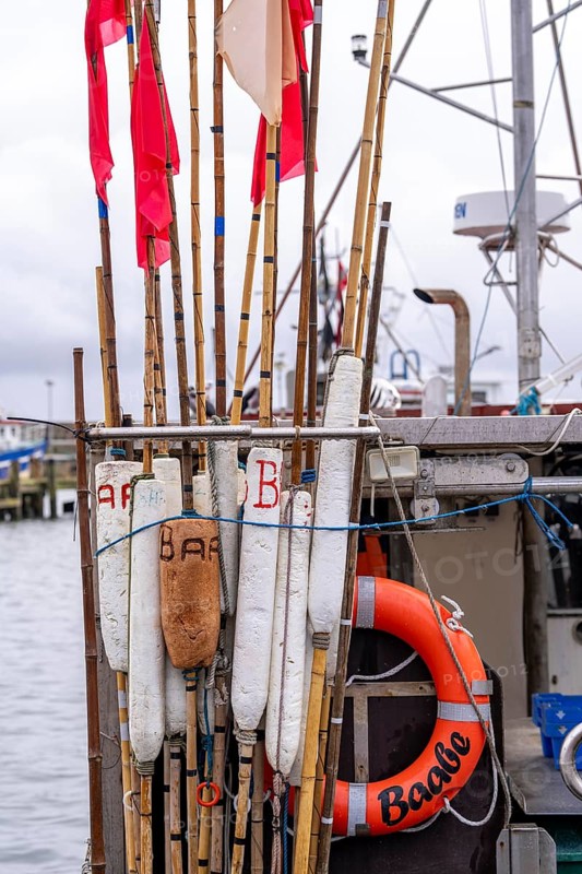 Fishing boats in the town harbour of Sassnitz, island of Rügen, floats of buoys for net marking, Mecklenburg-Vorpommern, Germany, Europe