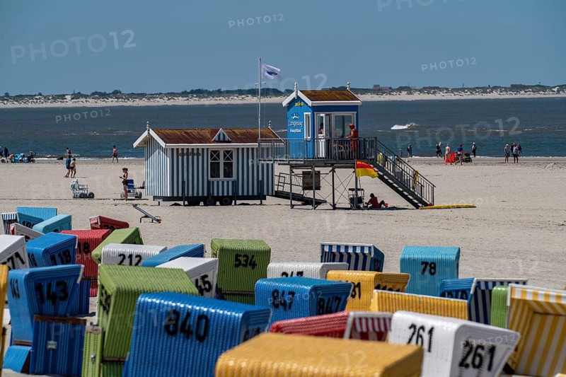 North Sea island of Langeoog, early summer, shortly after the first easing of the lockdown in the Corona crisis, still quite few tourists on the beach, beach chairs, DLRG watchtower, view to Baltrum, Lower Saxony, Germany, Europe