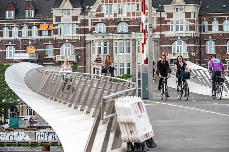 Cyclists on the Lille Langebro cycle and pedestrian bridge over the harbour, Copenhagen is considered the cycling capital of the world, 45% of the population travel by bike, Denmark, Europe