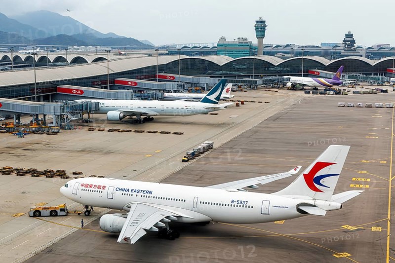A China Eastern Airlines Airbus A330-200 aircraft with registration number B-5937 at Chek Lap Kok Airport (HKG) in Hong Kong, China, Asia