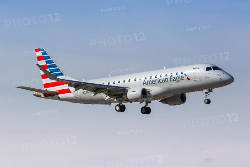 An Embraer 175 aircraft of American Eagle Envoy Air with the registration number N246NN at Miami Airport, USA, North America
