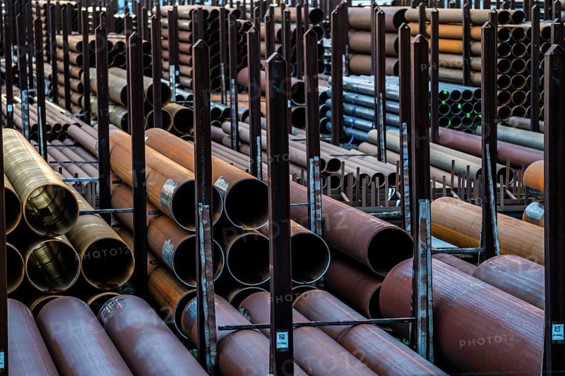 Warehouse for steel pipes in Duisburg harbour, steel pipes in various diameters, North Rhine-Westphalia, Germany, Europe