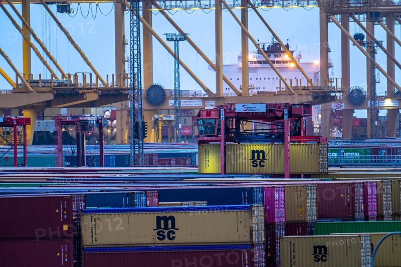 Container terminal in the seaport of Bremerhaven, Eurogate Container Terminal with almost 50 container gantry cranes, cranes, on a length of over 4 KM at the mouth of the Weser, straddle carriers bring the containers to and from the container ships, or store them between, Bremerhaven, Bremen, Germany, Europe
