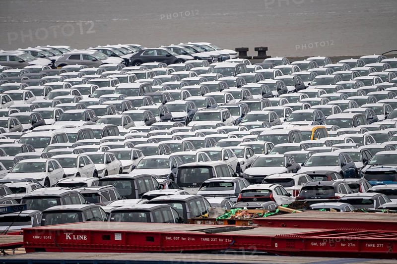 Parking space for import vehicles, hundreds of Hyundai Ioniq, electric cars, waiting for onward transport, at the EUROGATE container terminal in the overseas harbour of Bremerhaven, Lower Saxony, Germany, Europe