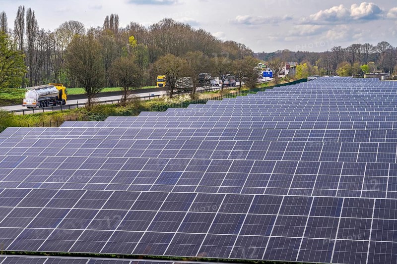 Solar park near Neukirchen-Vluyn, along the A40 motorway, over 10, 000 solar modules spread over 4.2 hectares, generating 6 million kilowatt hours per year, North Rhine-Westphalia, Germany, Europe