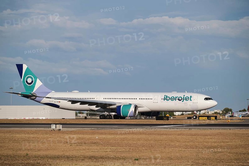 Lisbon, Portugal - September 2, 2023: Iberojet Airbus A330-941 passenger plane taxi on runway in Humberto Delgado Airport in Lisbon
